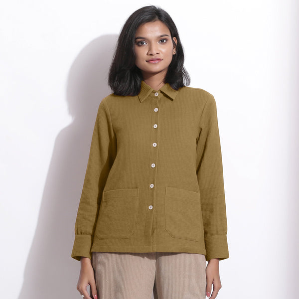 Front View of a Model wearing Olive Green Waffle Button-Down Pocket Shirt