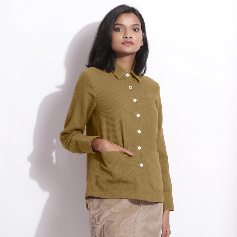 Right View of a Model wearing Olive Green Waffle Button-Down Pocket Shirt