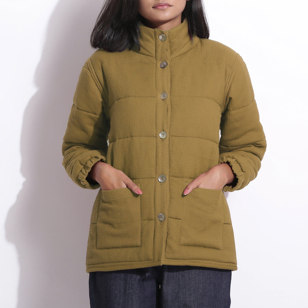 Front Detail of a Model wearing Olive Green Waffle Quilted Puffer Jacket