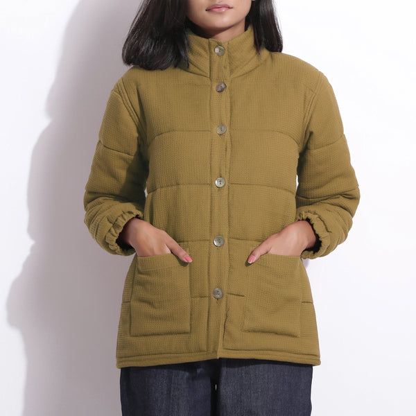 Front Detail of a Model wearing Olive Green Waffle Quilted Puffer Jacket