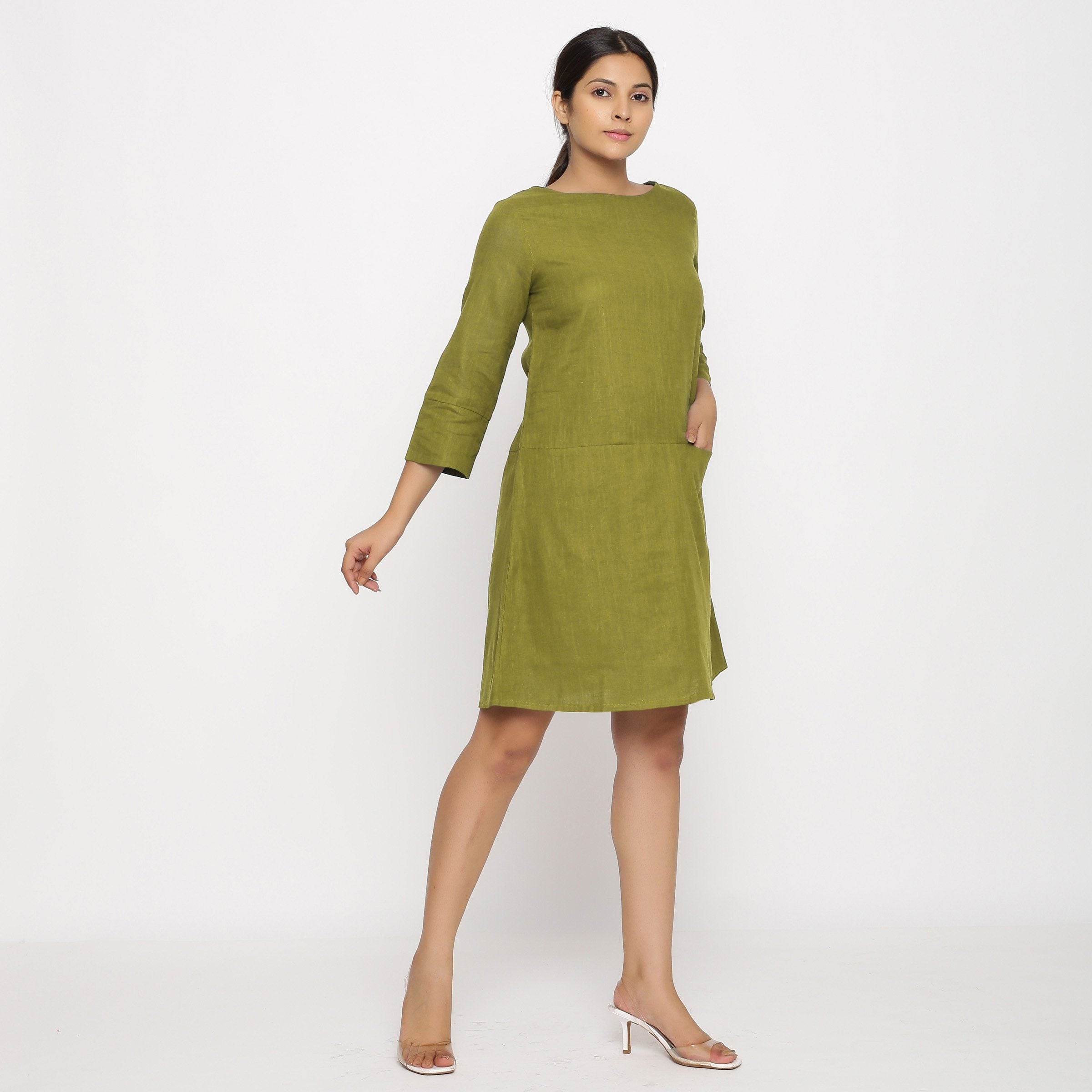 Right View of a Model wearing Olive Green Yoked Cotton Tunic Dress