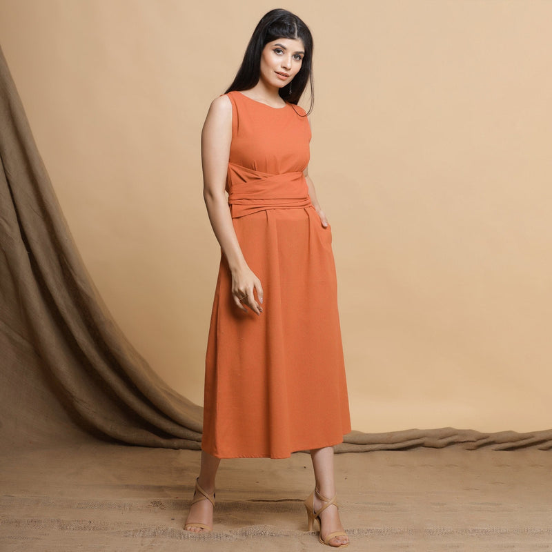 Right View of a Model wearing Orange A-Line Midi Dress