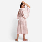 Back View of a Model wearing Orange Block Printed Cotton Shift Dress