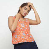 Right View of a Model wearing Orange Floral Block Printed Square Neck Cotton Top