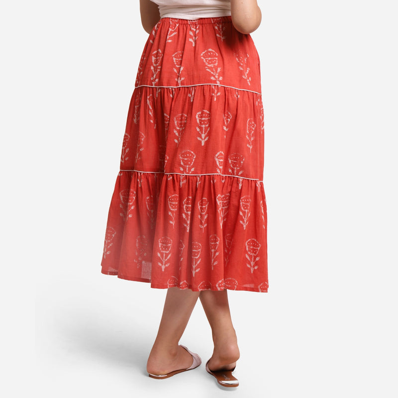 Back View of a Model wearing Orange Floral Block Print Cotton Maxi Skirt