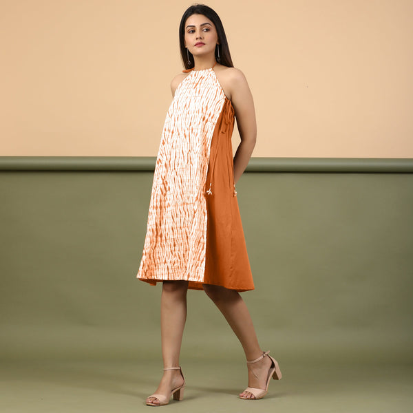 Front View of a Model wearing Orange Shibori Halter Neck A line Dress