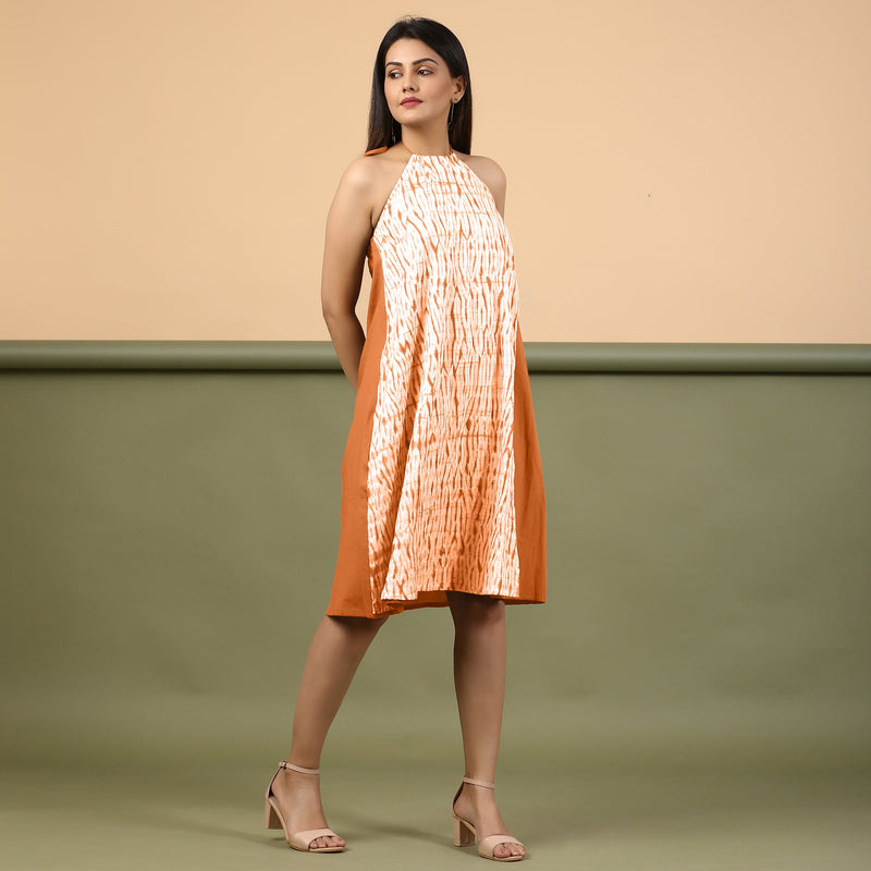 Right View of a Model wearing Orange Shibori Halter Neck A line Dress