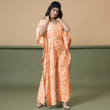 Front View of a Model wearing Orange Shibori V-Neck Kaftan Jumpsuit