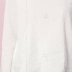 Front Detail of a Model wearing Organic Cotton Embroidered Split Neck Top