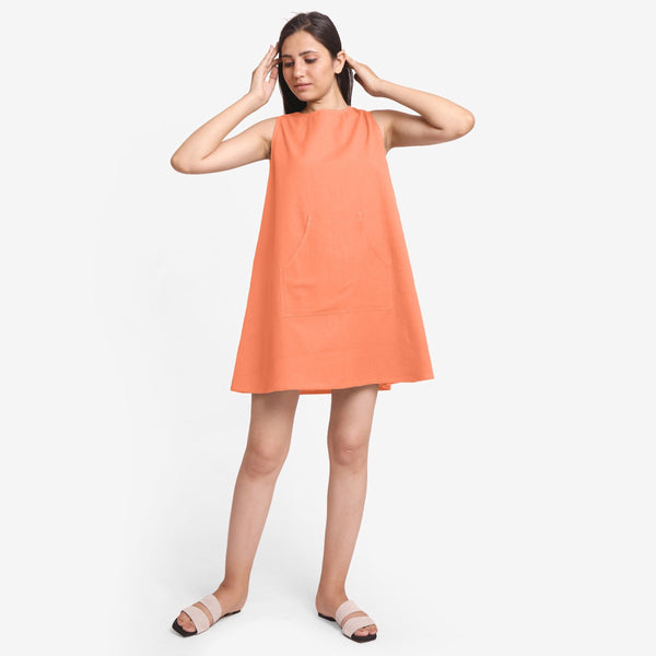 Front View of a Model wearing Peach Cotton Flax Kangaroo Pocket Dress