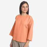 Left View of a Model wearing Peach Cotton Flax Round Neck A-Line Top