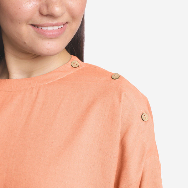 Front Detail of a Model wearing Peach Cotton Flax Round Neck A-Line Top