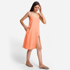 Right View of a Model wearing Peach Cotton Flax Strappy Slit Dress
