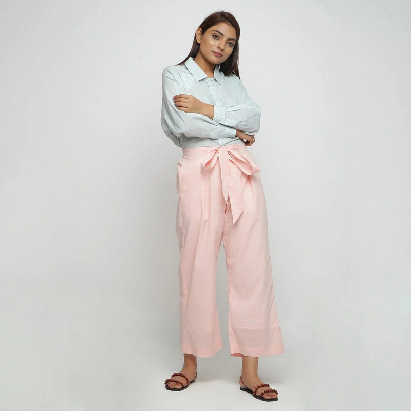 Front View of a Model wearing Peach Mid Rise Cotton Straight Pant