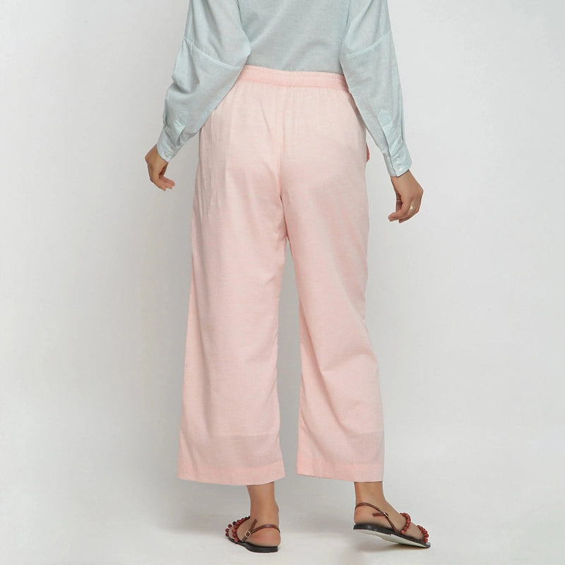 Back View of a Model wearing Peach Mid Rise Cotton Straight Pant