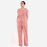 Front View of a Model wearing Peach Block Print Floor Length Cotton Jumpsuit