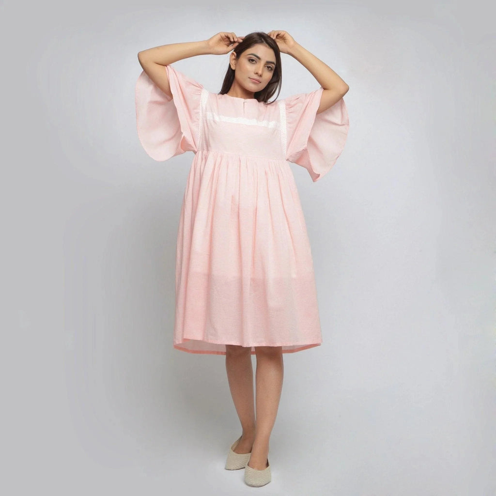 Front View of a Model wearing Peach Lined Cotton Chambray Dress