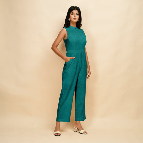 Right View of a Model wearing Pine Green 100% Linen Sleeveless Jumpsuit