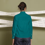 Back View of a Model wearing Solid Pine Green Linen Button-Down Straight Shirt