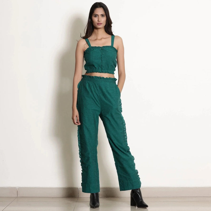 Front View of a Model wearing Pine Green Frill Warm Cotton Mid-Rise Paperbag Pant