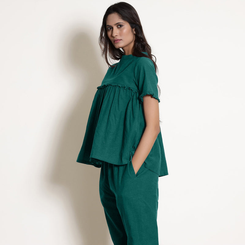 Left View of a Model wearing Pine Green Wine Gathered Frilled Top