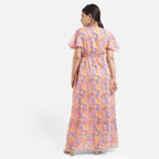 Back View of a Model wearing Pink Deep Neck Fit and Flare Dress
