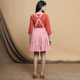 Back View of a Model wearing Pink Cotton Flax Pleated Knee Length Dress