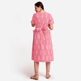 Back View of a Model wearing Pink Dabu Block Printed Cotton Midi Dress