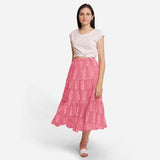 Front View of a Model wearing Pink Dabu Floral Block Printed Cotton Maxi Skirt