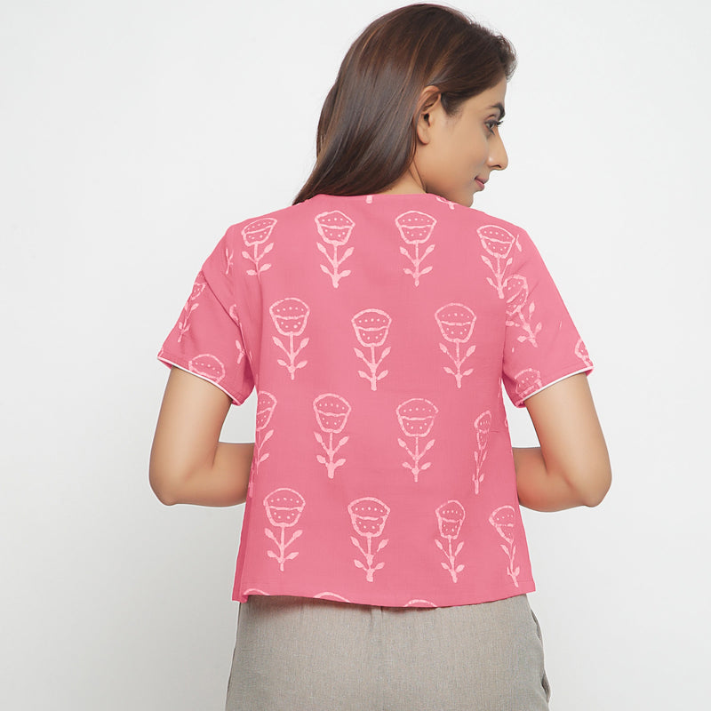 Back View of a Model wearing Pink Dabu Floral Block Print Button-Down Cotton Top