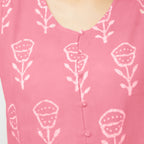 Front Detail of a Model wearing Pink Dabu Floral Block Print Button-Down Cotton Top