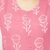 Front Detail of a Model wearing Pink Dabu Floral Block Print Button-Down Cotton Top