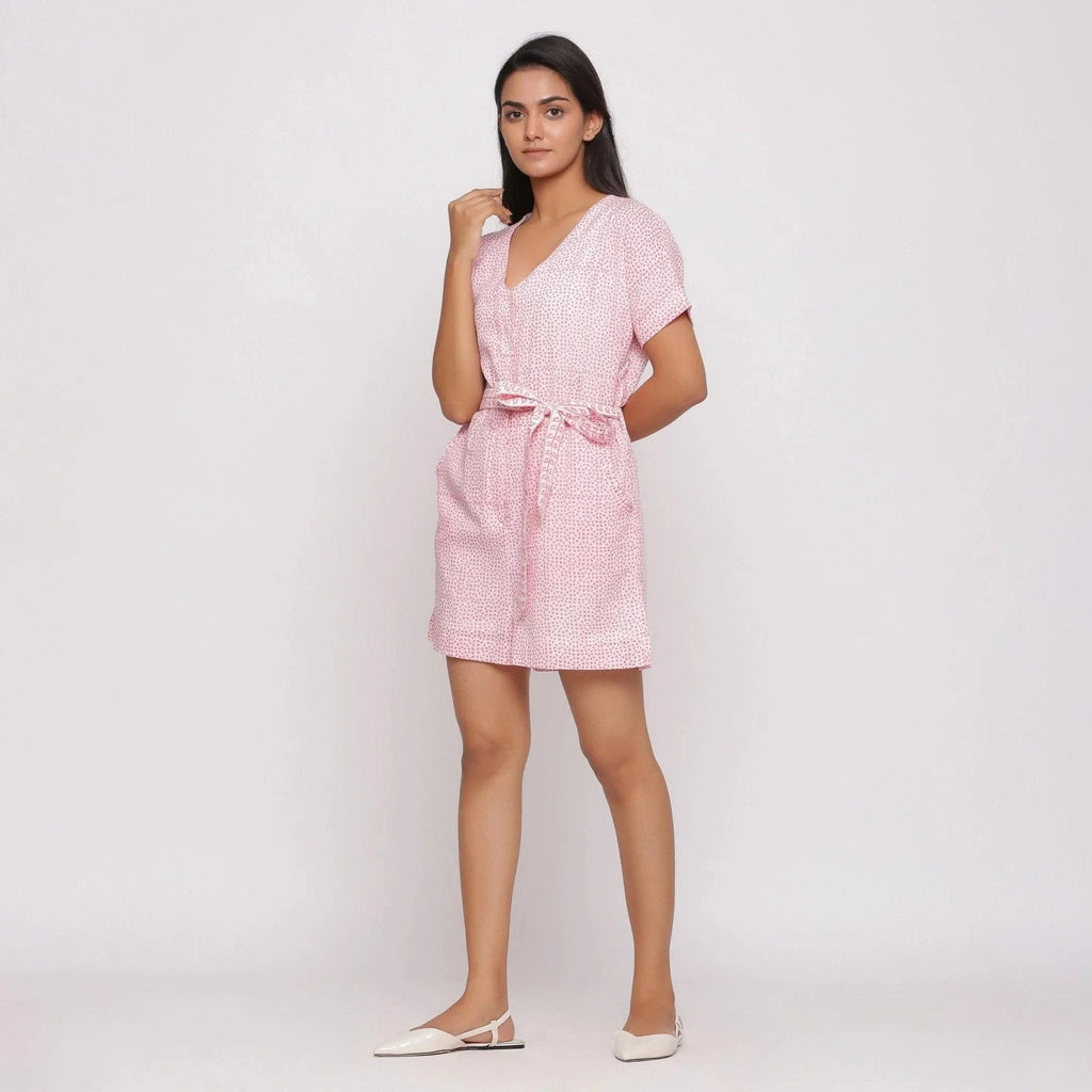 Left View of a Model wearing Pink Ditsy Block Print Cotton Short Romper