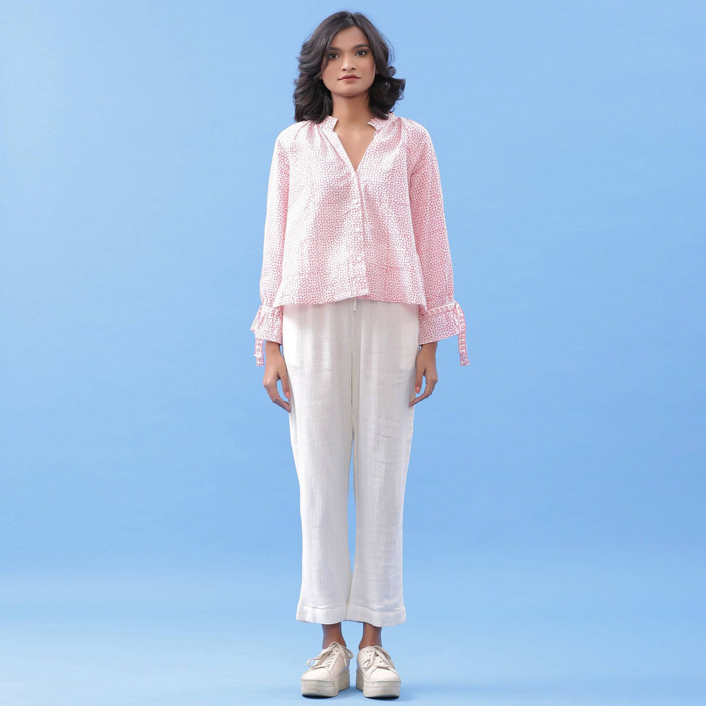 Front View of a Model wearing Pink Hand Block Printed Button-Down Blouse