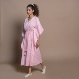 Left View of a Model wearing Pink Hand Block Printed Cotton Midi Kaftan Dress