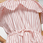 Front Detail of a Model wearing Pink Hand-Screen Print Playsuit