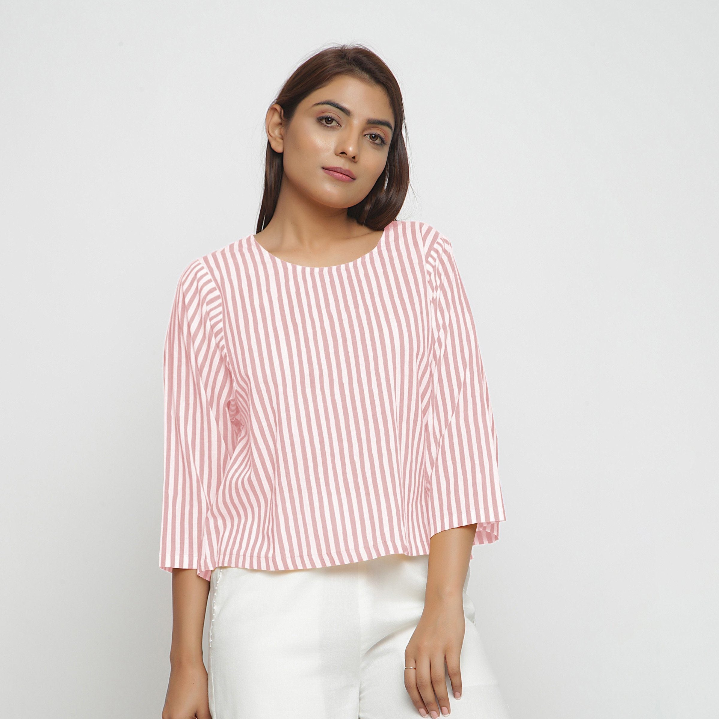 Front View of a Model wearing Pink Hand Screen Printed Straight Top