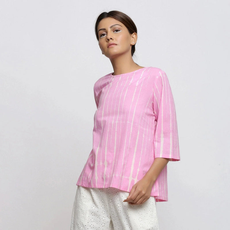 Front View of a Model wearing Pink Hand Tie-Dye Cotton Round Neck A-Line Top