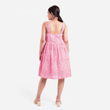 Back View of a Model wearing Pink Paisley Fit and Flare Cotton Dress