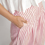 Front Detail of a Model wearing Pink Striped Wide Legged Cotton Pant