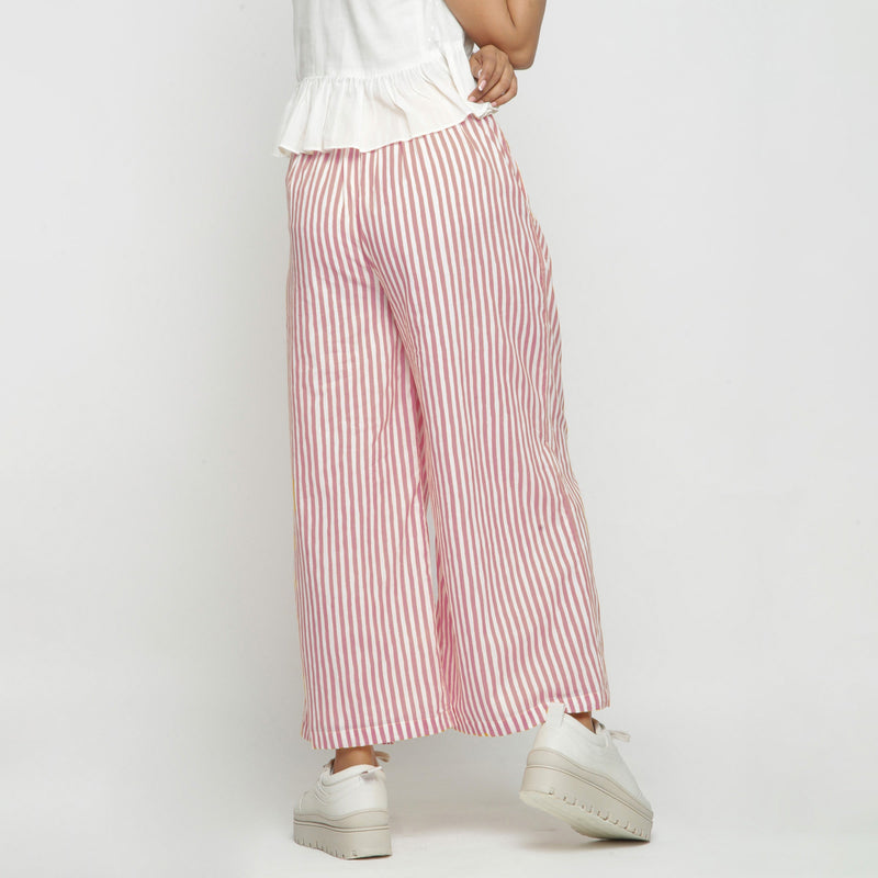 Back View of a Model wearing Pink Striped Wide Legged Cotton Pant