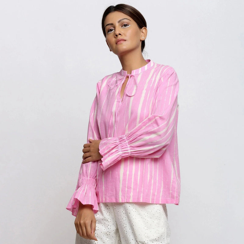 Left View of a Model wearing Pink Tie-Dye 100% Cotton Shirred Blouson Top