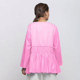 Back View of a Model wearing Pink Tie Dyed Anti-Fit Outerwear