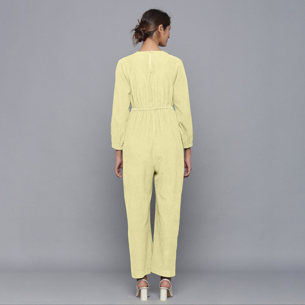 Back View of a Model wearing Pista Yellow Corduroy Comfy Jumpsuit