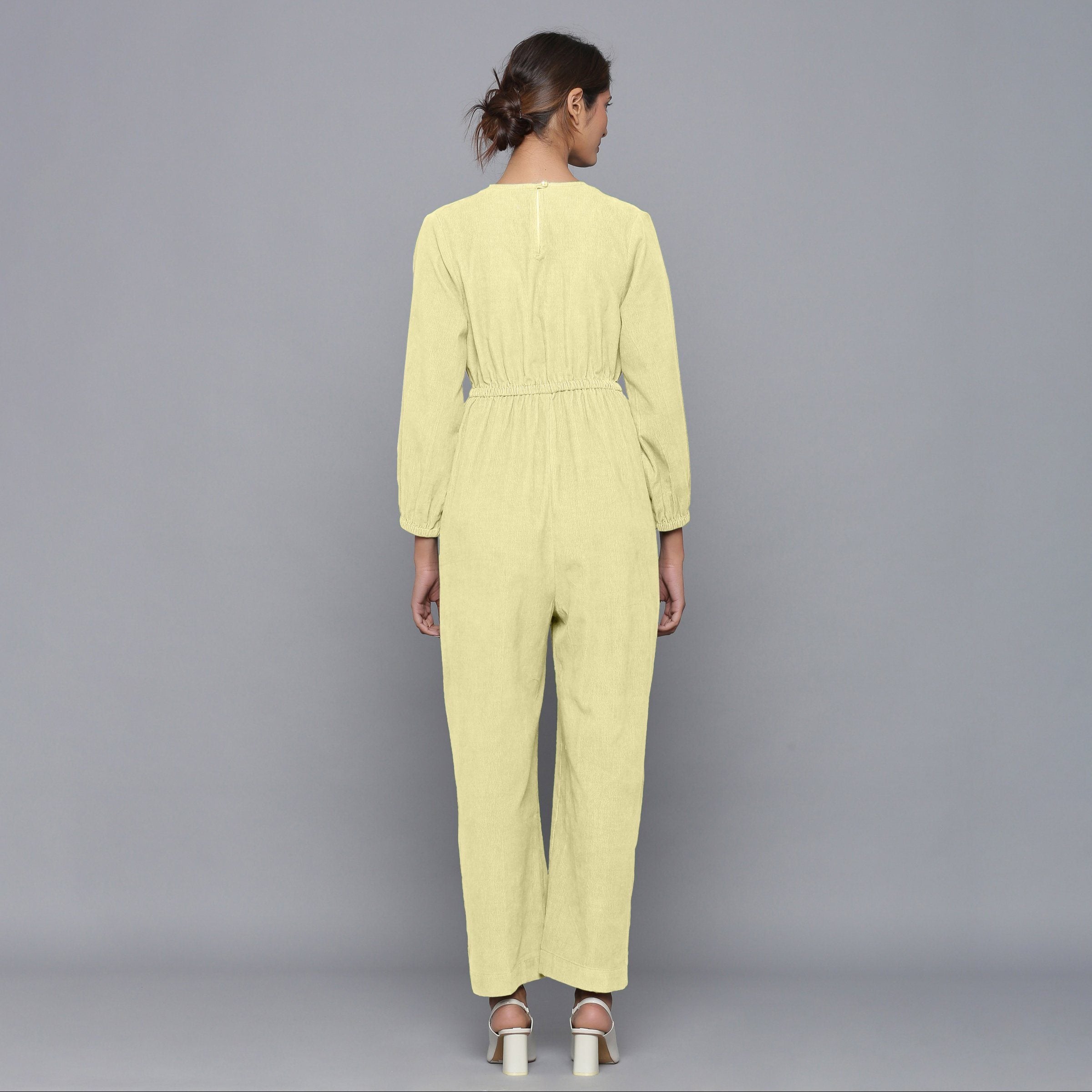 Back View of a Model wearing Pista Yellow Corduroy Comfy Jumpsuit