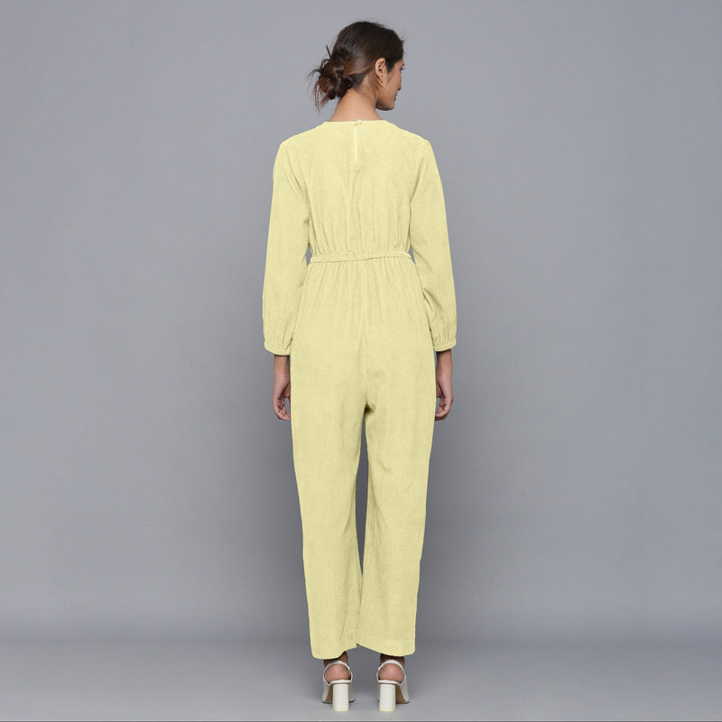 Back View of a Model wearing Pista Yellow Corduroy Comfy Jumpsuit