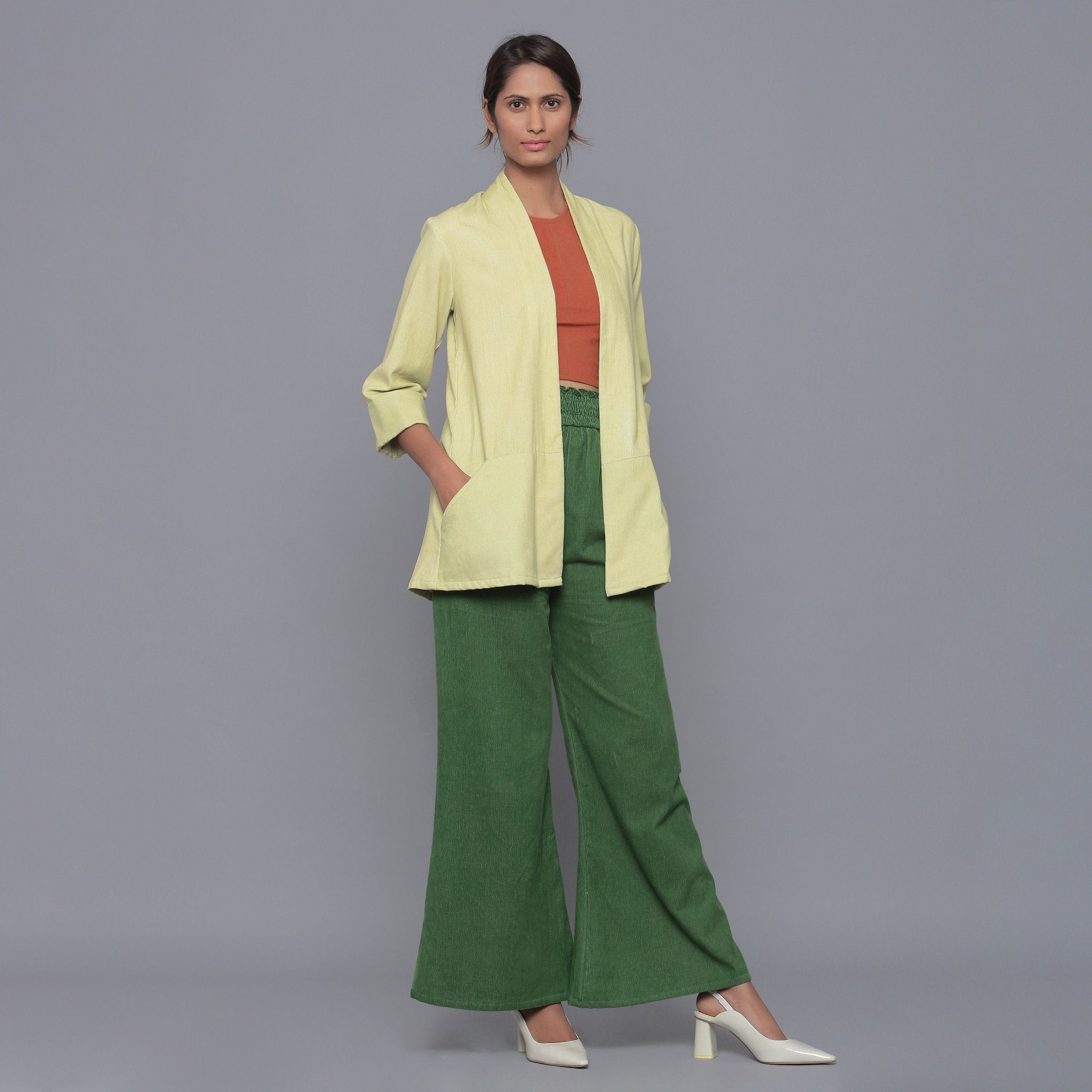 Front View of a Model wearing Pistachio Cotton Corduroy Shrug