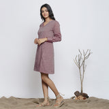 Left View of a Model wearing Plum Handspun Button-Down A-Line Dress