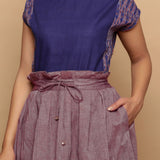 Front Detail of a Model wearing Plum Handspun Handwoven Paperbag Skirt