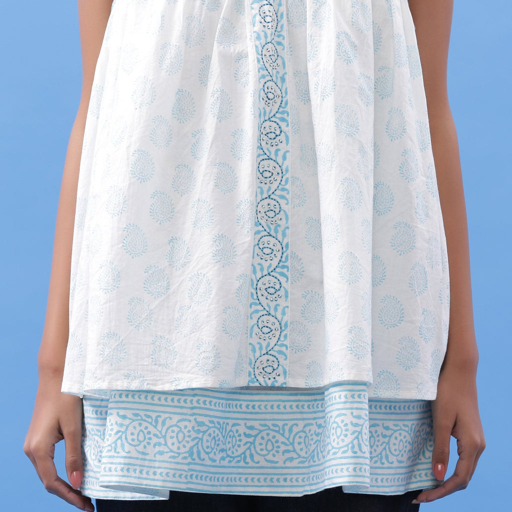 Front Detail of a Model wearing Powder Blue Block Printed V-Neck Tunic Top